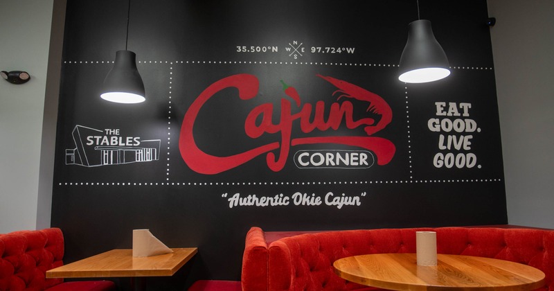 Interior, red booths and wooden tables