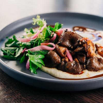 Grilled Mushrooms, Leek + Tofu Soubise, Salsa Macha, Pickled Ramps, Cilantro, Parsley GF, Vegan.
