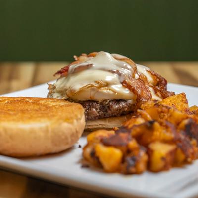 Bacon cheeseburger with potatoes.