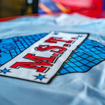 A tablecloth with MST logo on it.