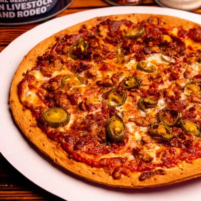 Sausage pizza with jalapenos.