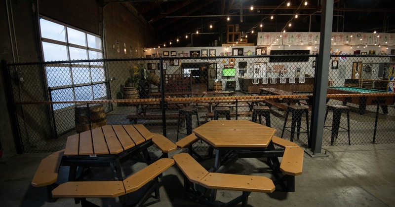 Interior area, conjoined tables and benches