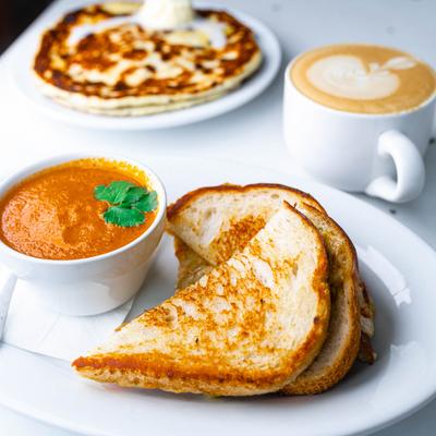 Tomato Bisque served with a latte.