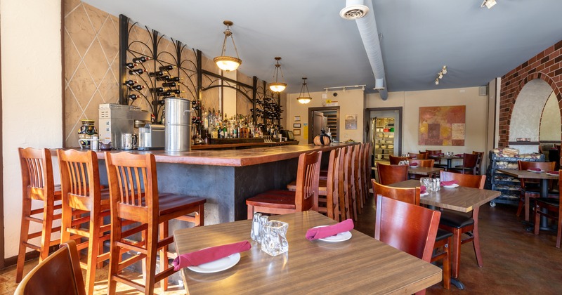 Interior, dining tables near the bar
