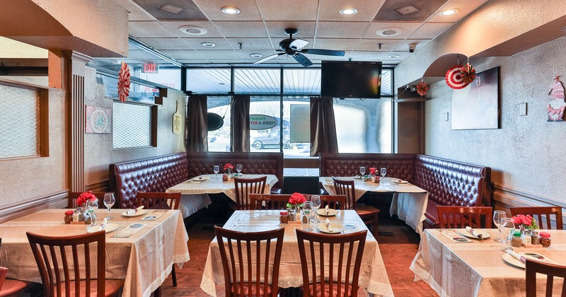 Interior, dining area, large corner banquette benches with tables and chairs