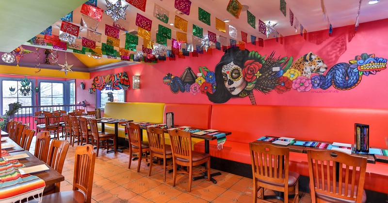 Interior, wide view, high back leather seating, wall painting