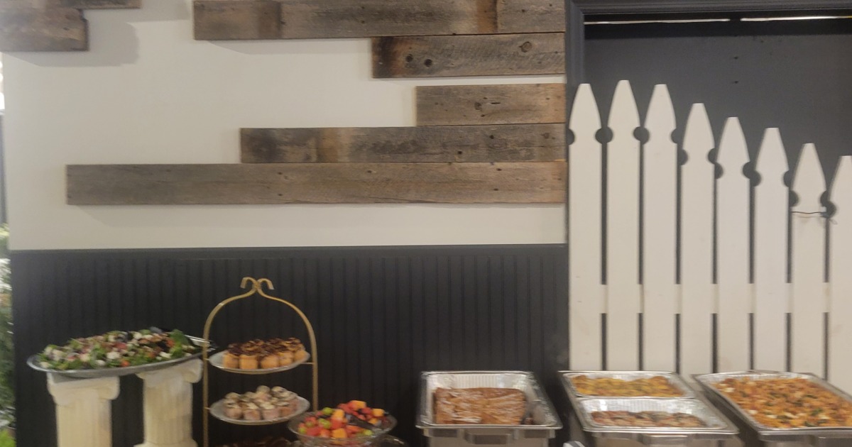 Buffet line with desserts and hot dishes