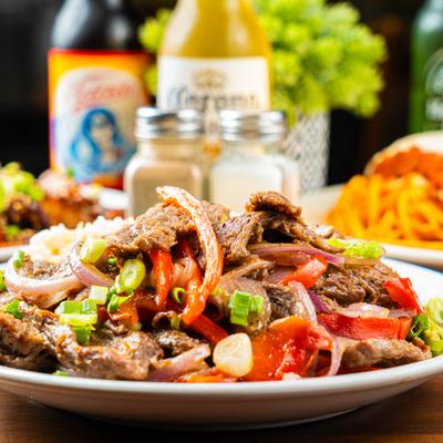 Beef stir-fry with peppers and onions.