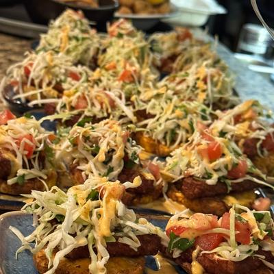 Big party platter of tostones con queso frito.