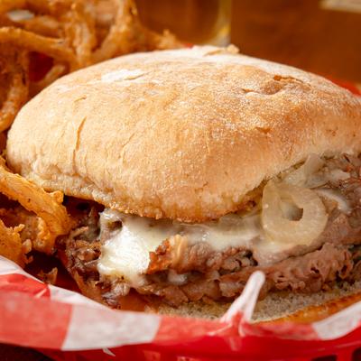Marinated ribeye and caramelized onions served with mozzarella on toasted garlic focaccia