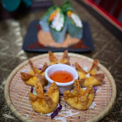 Crab Rangoon served with a house sweet dipping sauce.