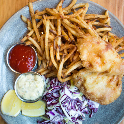 Fish and Chips with coleslaw, tarter sauce, and ketchup
