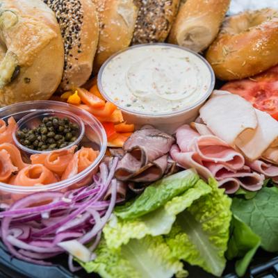 Bagel, meat and cheese platter.