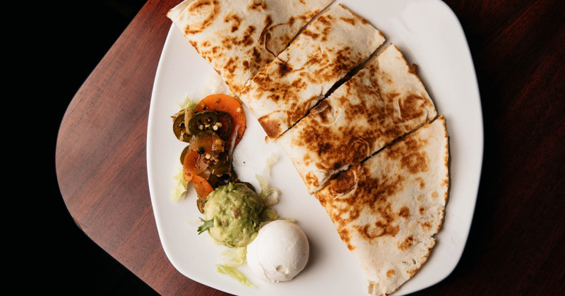 Cut quesadilla served, top view