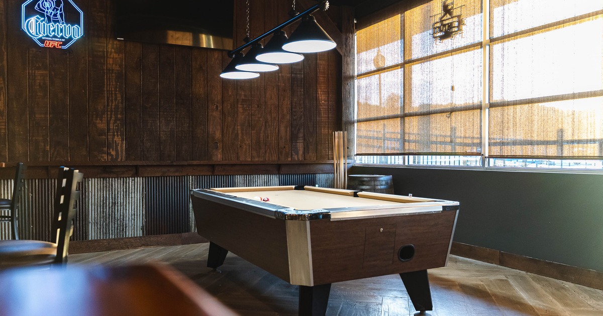 Interior, pool table near windows