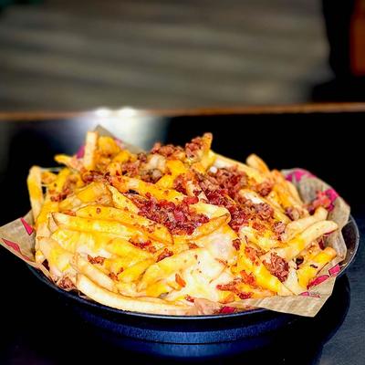 Loaded cheese and bacon fries.