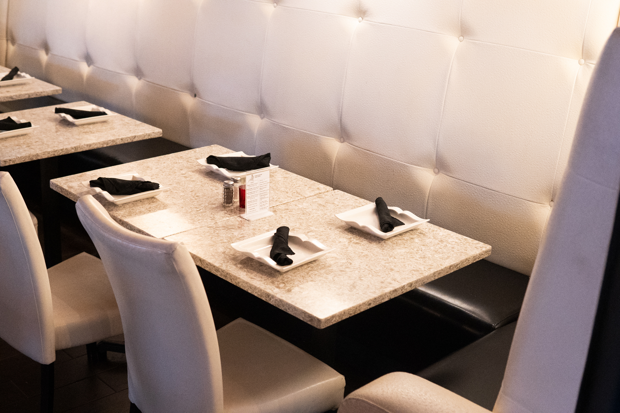 Interior, diner table set up, chairs and booths