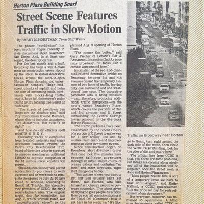 An old newspaper article titled Street Scene Features Traffic in Slow Motion