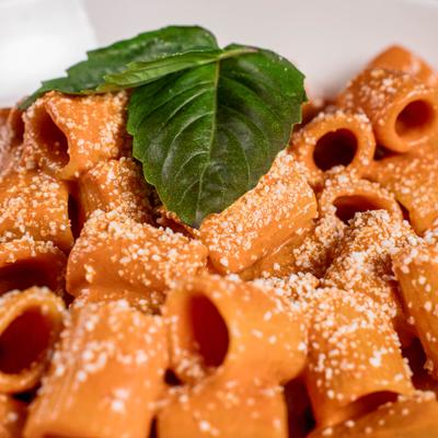Rigatoni pasta in pink vodka sauce.