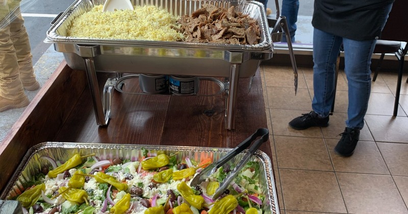 Catering food trays at an even