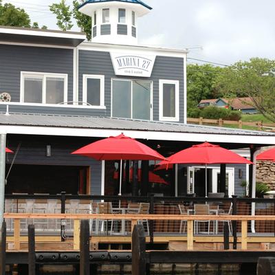 Exterior, patio with guest tables and parasols.