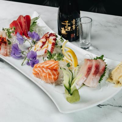 Salmon sashimi and sake.
