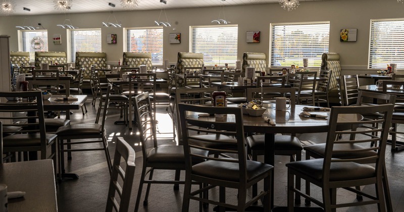 Interior, tables and chairs ready for guests