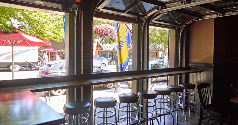 Bar stools by street window