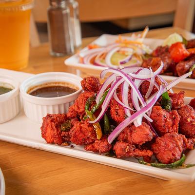 Chicken 65 served with two types of chutney.