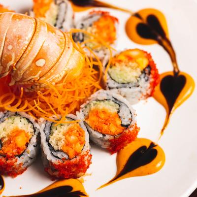 Lobster rolls, with crunch, cucumber, caviar, spicy mayo, ginger sauce and a lobster tail