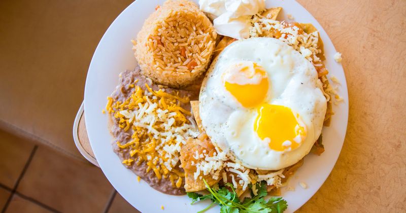 Fried eggs with rice and a mix of vegtables