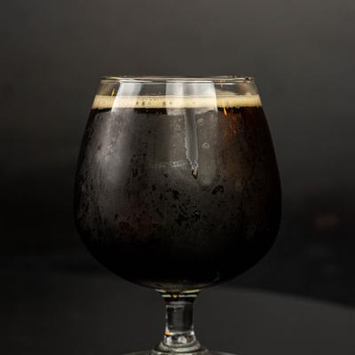 A glass of dark beer.