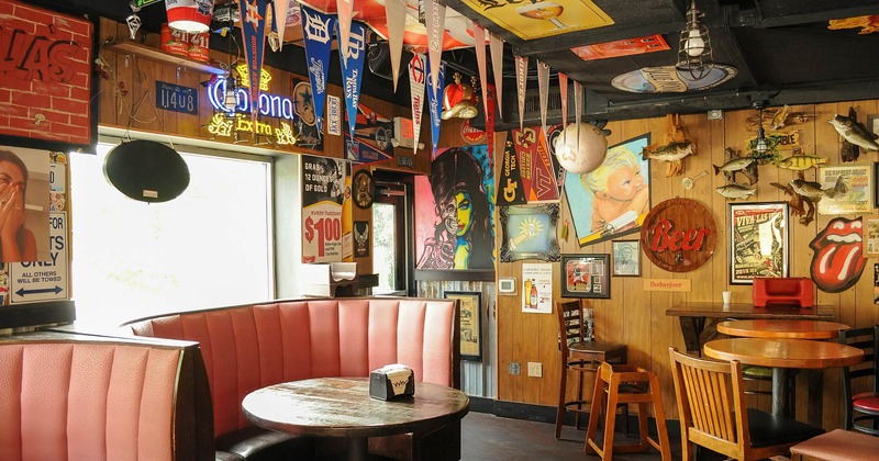 Interior, private seating area, lots of decoration items on the ceiling and walls