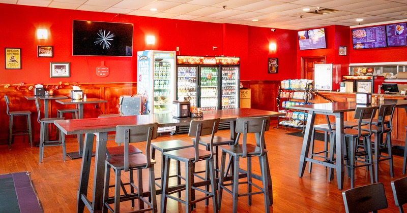 Interior, diner area, bar tables and chairs