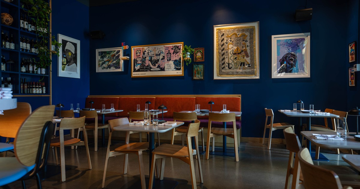 Interior, dining area with pictures on the wall