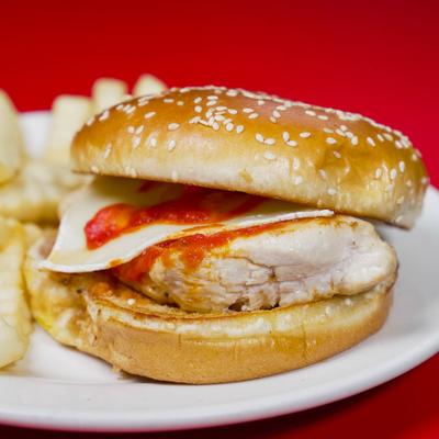 Chicken Parm Sandwich served with fries.