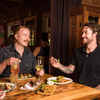 Customers dining and enjoying conversation