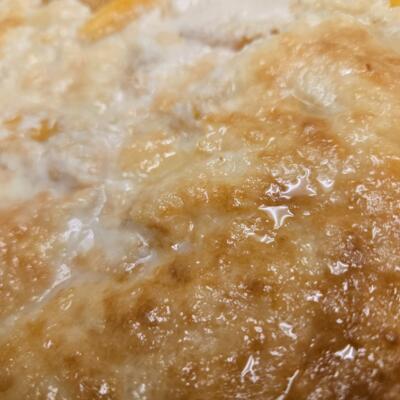 Close up of peach cobbler crust.