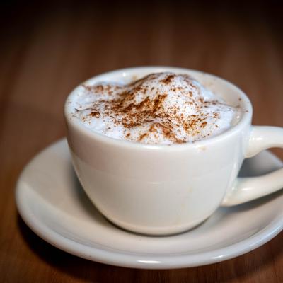 Cappuccino dusted with cocoa powder.