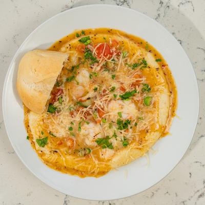 Shrimp and grits plate, top view.