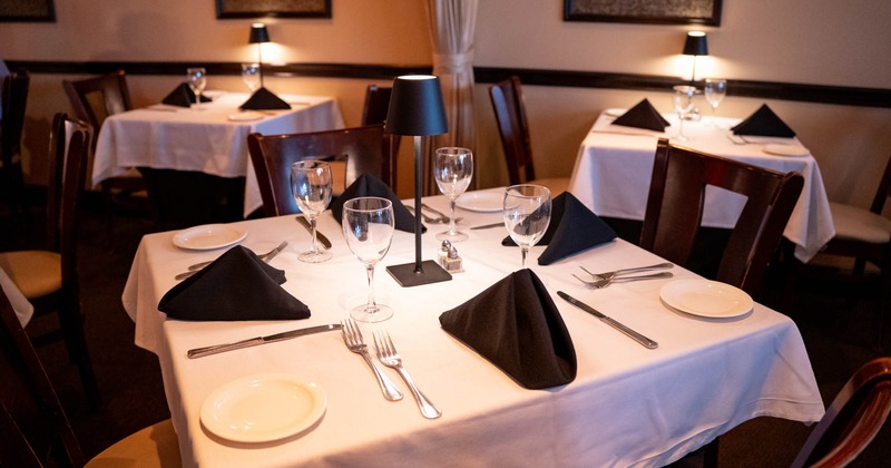 Interior, table for four ready for guests