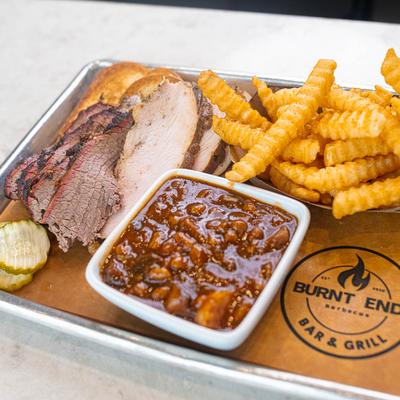 Smoked turkey, brisket, beans, and fries.