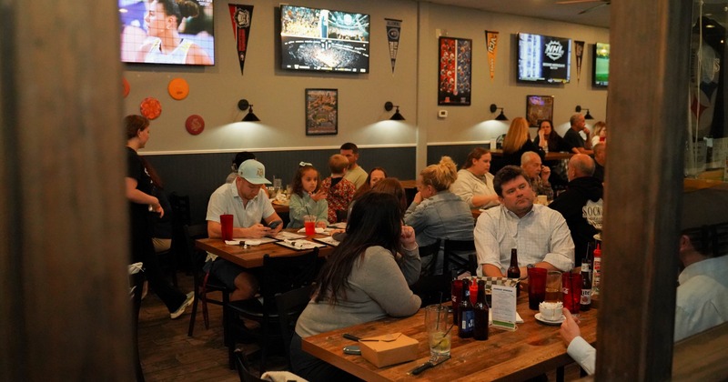 Interior, diner area, tables, chairs, guests