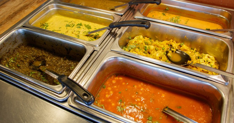 Spread of Indian cuisine served in a buffet setting