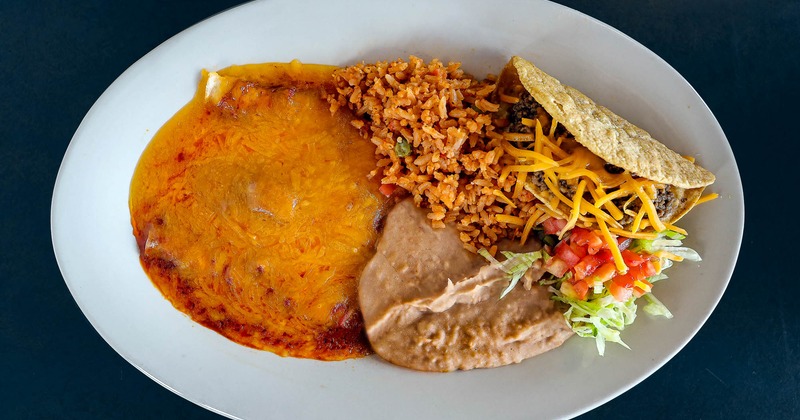 Enchiladas and beef taco combo plate