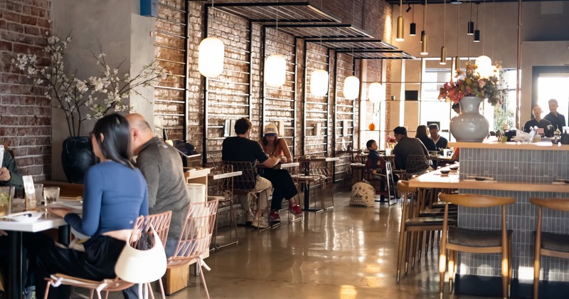 Cozy interior dining area with guests enjoying their food