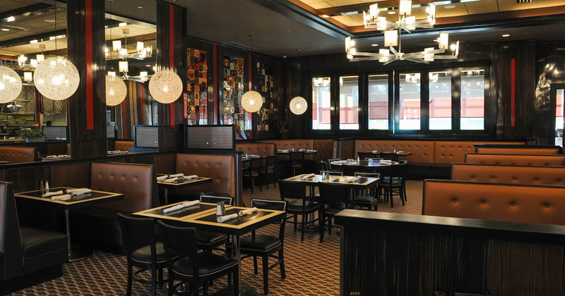 Interior, tables with cutlery ready for guests