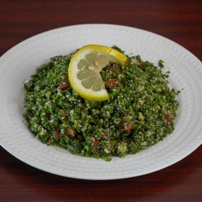Tabbouli Salad, chopped parsley, tomato, onion, lettuce, mint, and Bulgur wheat.