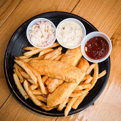 Fish and Chips, served with tartar sauce, coleslaw, and malt vinegar.