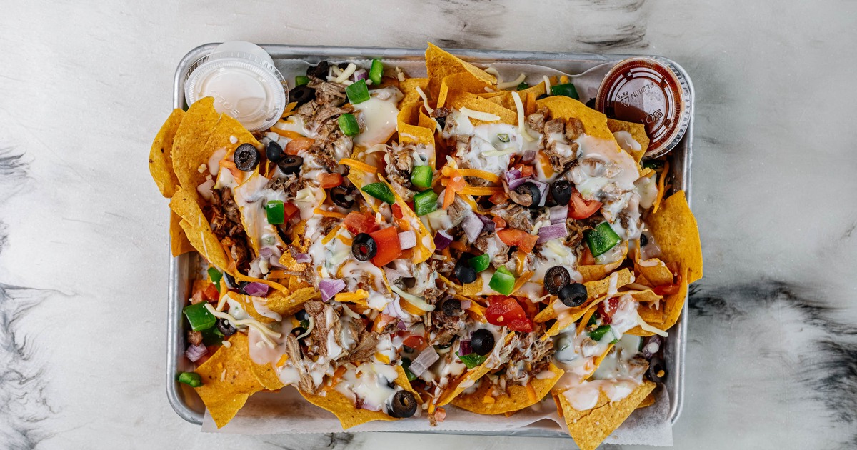 Loaded nachos with olives and jalapenos